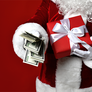 Santa with present and a handful of $100 bills