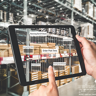 iPad with augmented reality view of a warehouse shelf with inventory